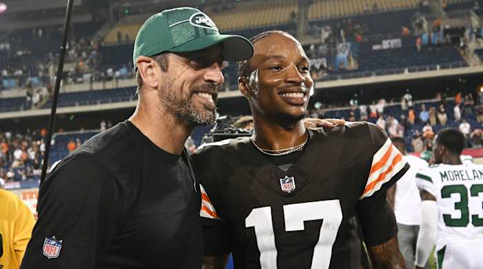 New York Jets quarterback Aaron Rodgers poses with Cleveland Browns rookie QB Dorian Thompson-Robinson